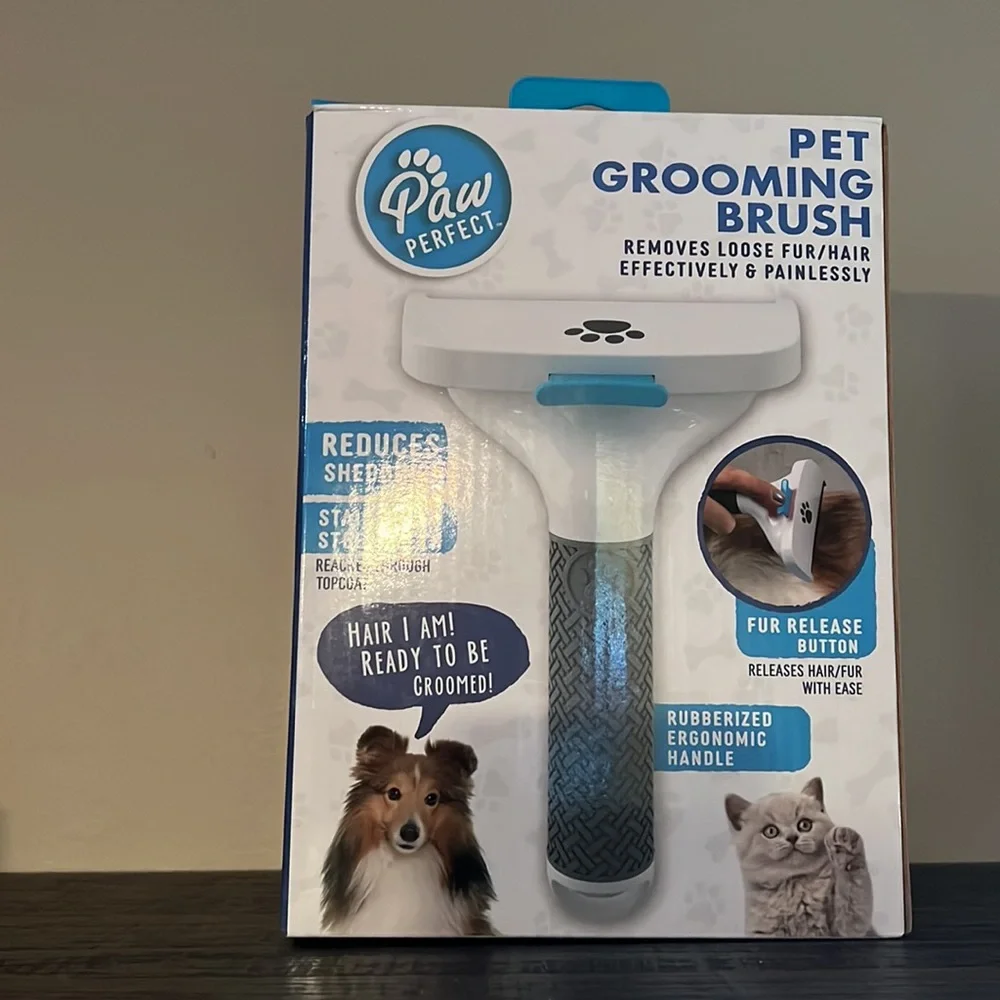 Paw perfect pet grooming brush